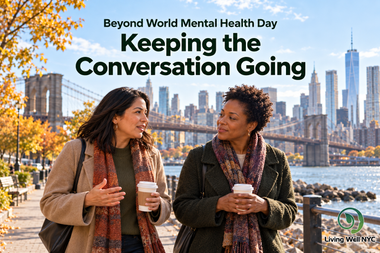 Two friends talking over coffee near the Brooklyn Bridge in autumn, with the words “Beyond World Mental Health Day: Keeping the Conversation Going.”